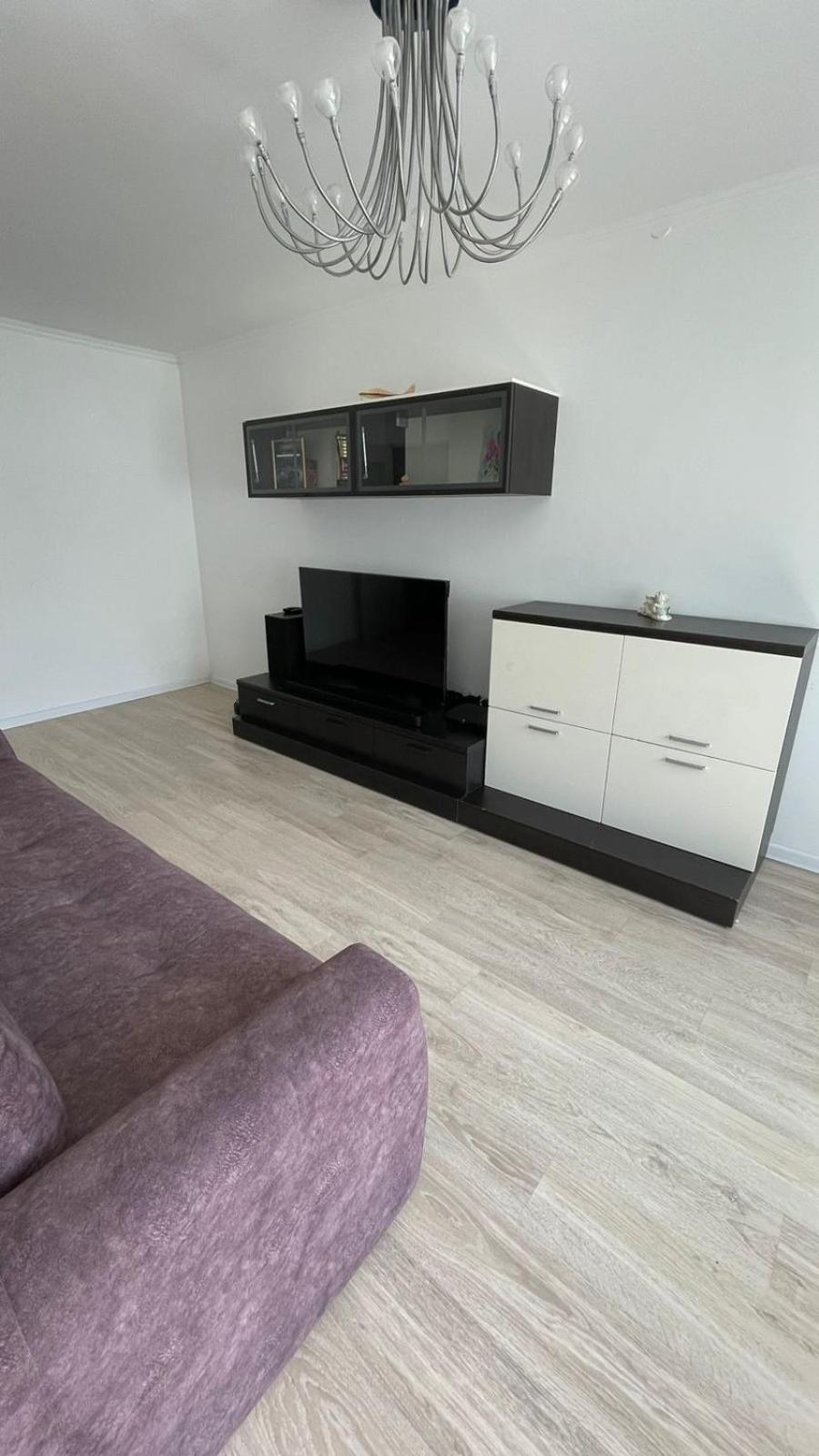 между правым и левым берегом, рядом с набережной на улице габдуллина Apartment