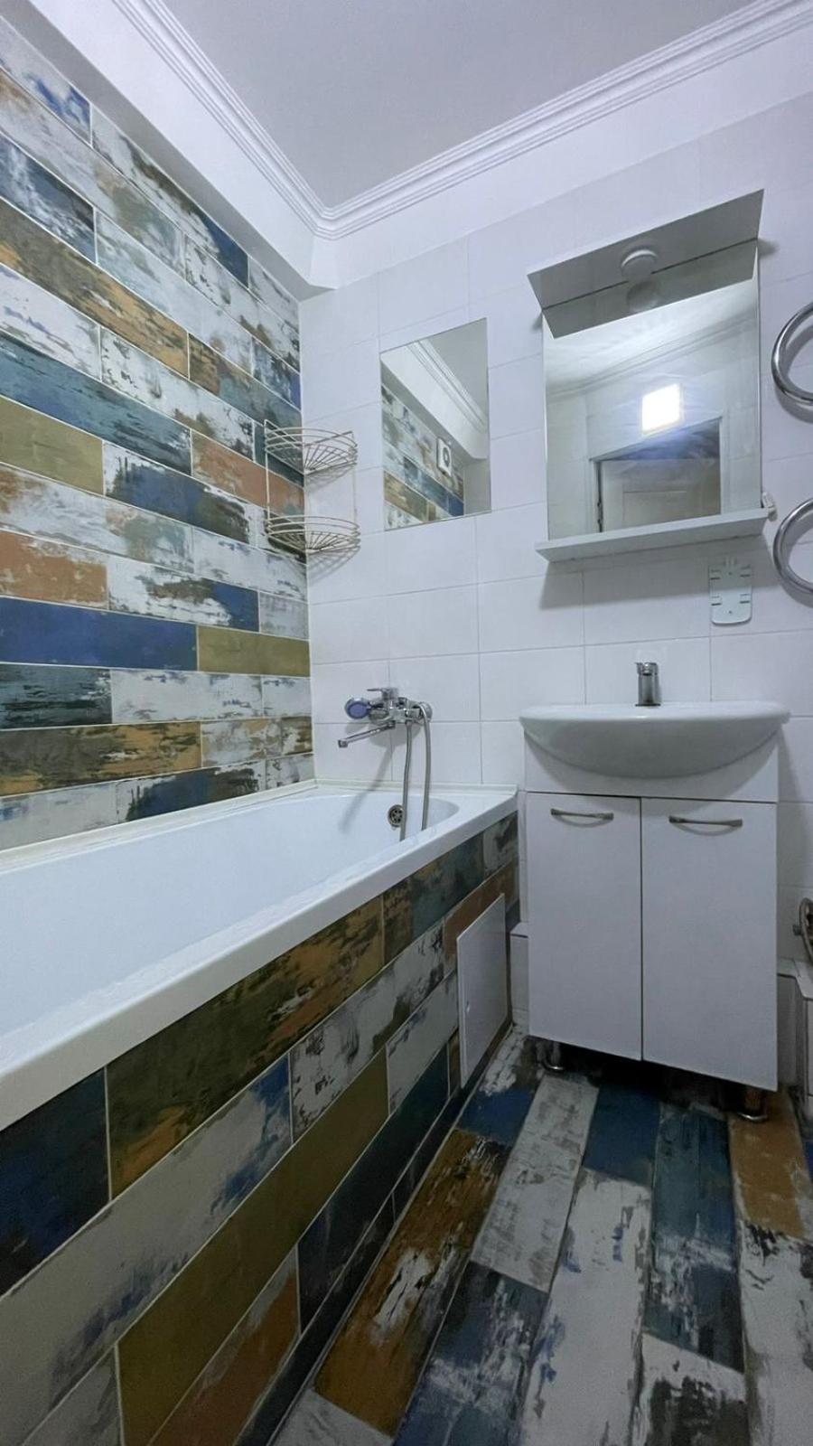 Apartment между правым и левым берегом, рядом с набережной на улице габдуллина *